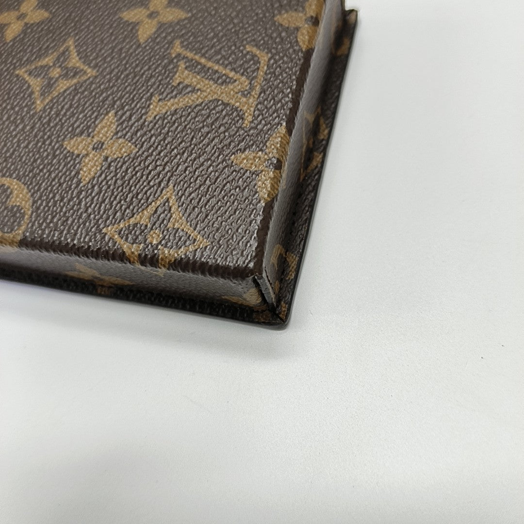 Monogram Coated Canvas Clutch Brown