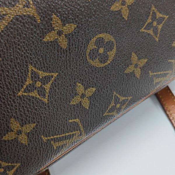 CITE Monogram Coated Canvas Brown