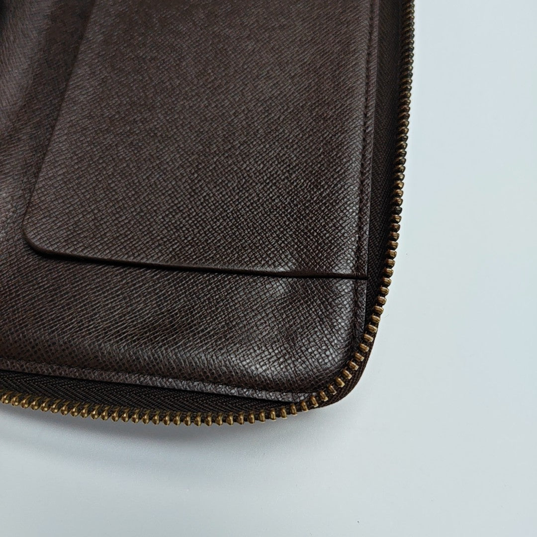 ZIPPY Damier Ebene Coated Canvas Brown Wallet