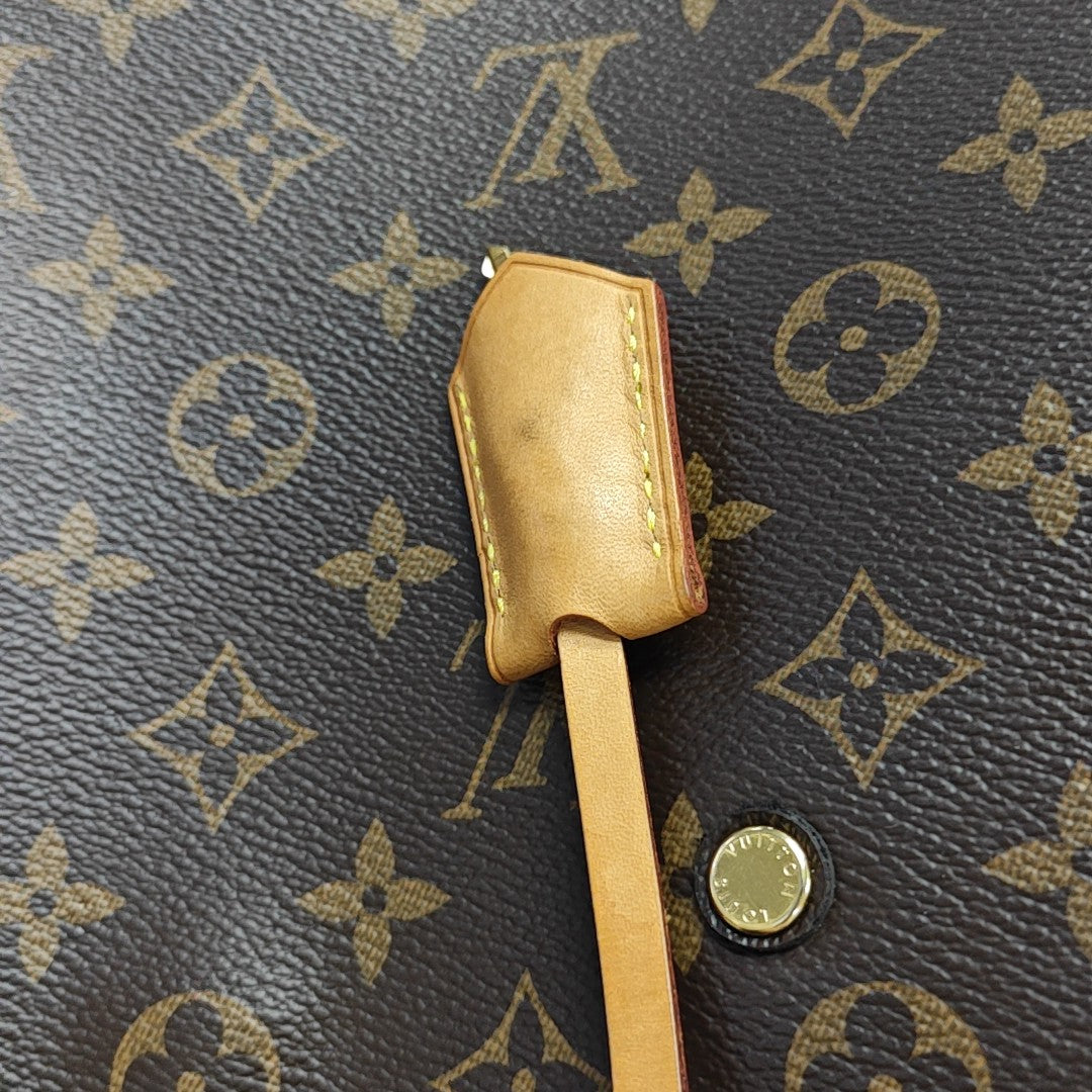 MONTAIGNE GM Monogram Coated Canvas Brown