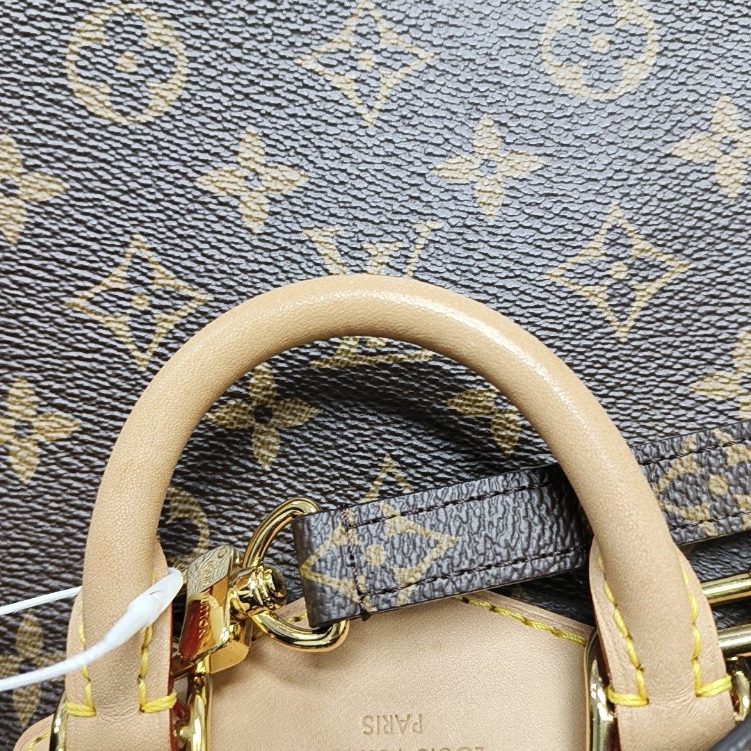 EXCURSION PM Monogram Coated Canvas Brown