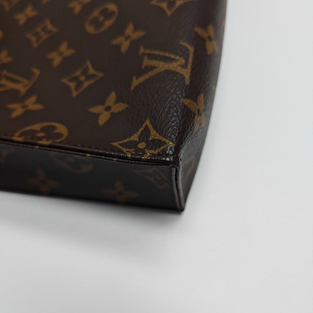 TOILET POCKET 26 Monogram Coated Canvas Brown