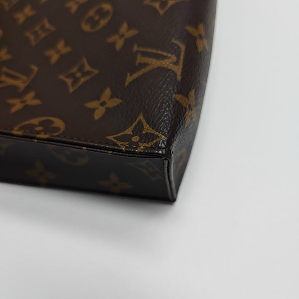 TOILET POCKET 26 Monogram Coated Canvas Brown