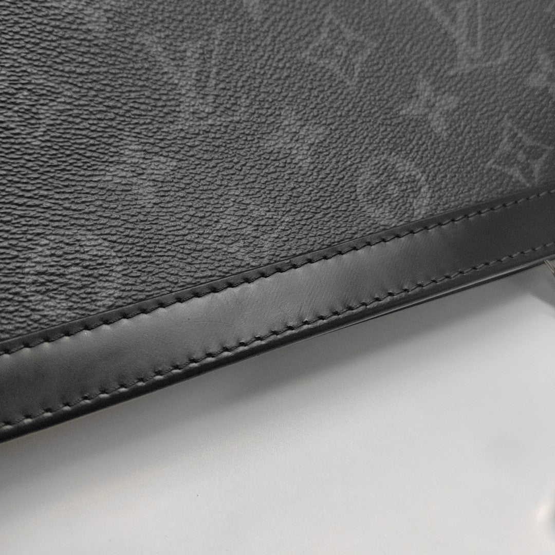 Pochette Voyag MM Monogram Coated Canvas Black