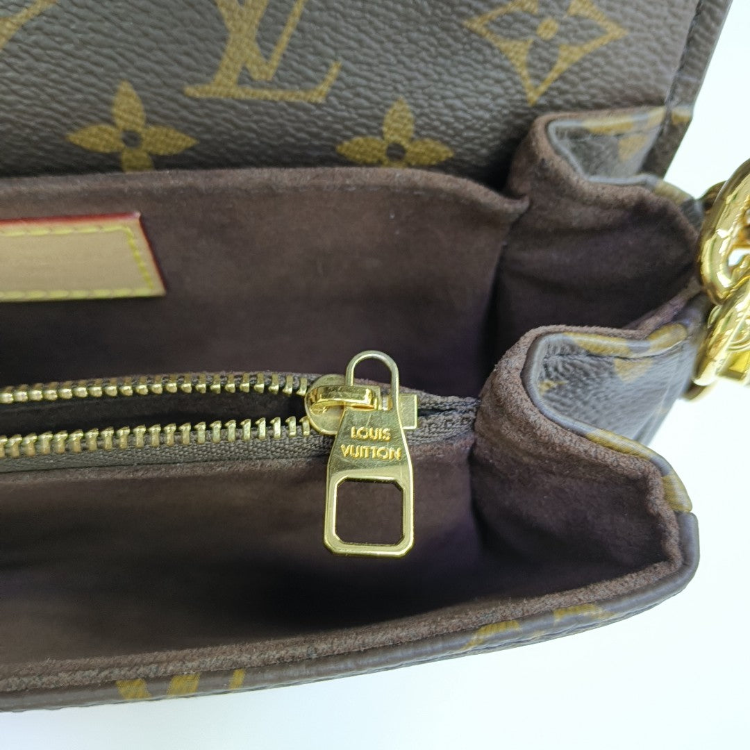 MÉTIS EAST WEST Monogram Coated Canvas Brown