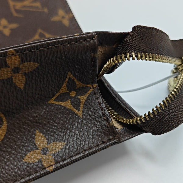 TOILET POCKET 26 Monogram Coated Canvas Brown