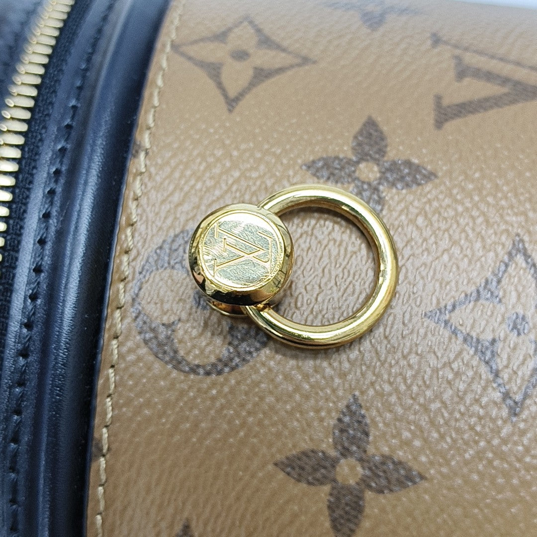 CANNES PM Monogram Coated Canvas Brown