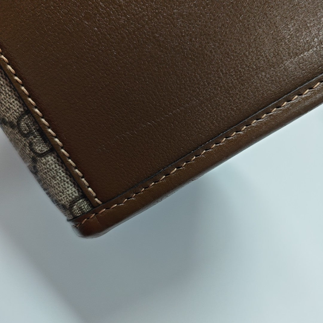 Retro Small Monogram Coated Canvas Brown