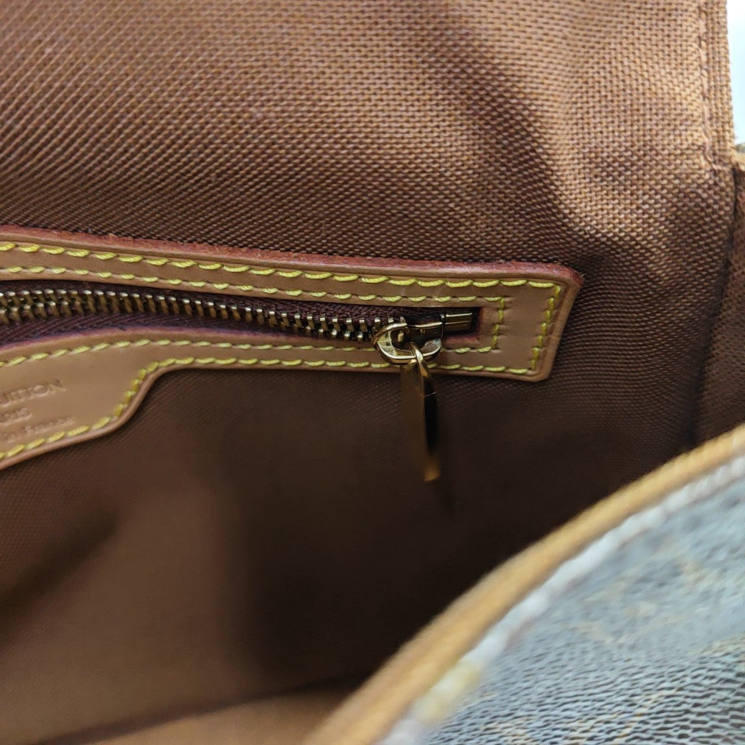 LOOPING PM Monogram Coated Canvas Brown