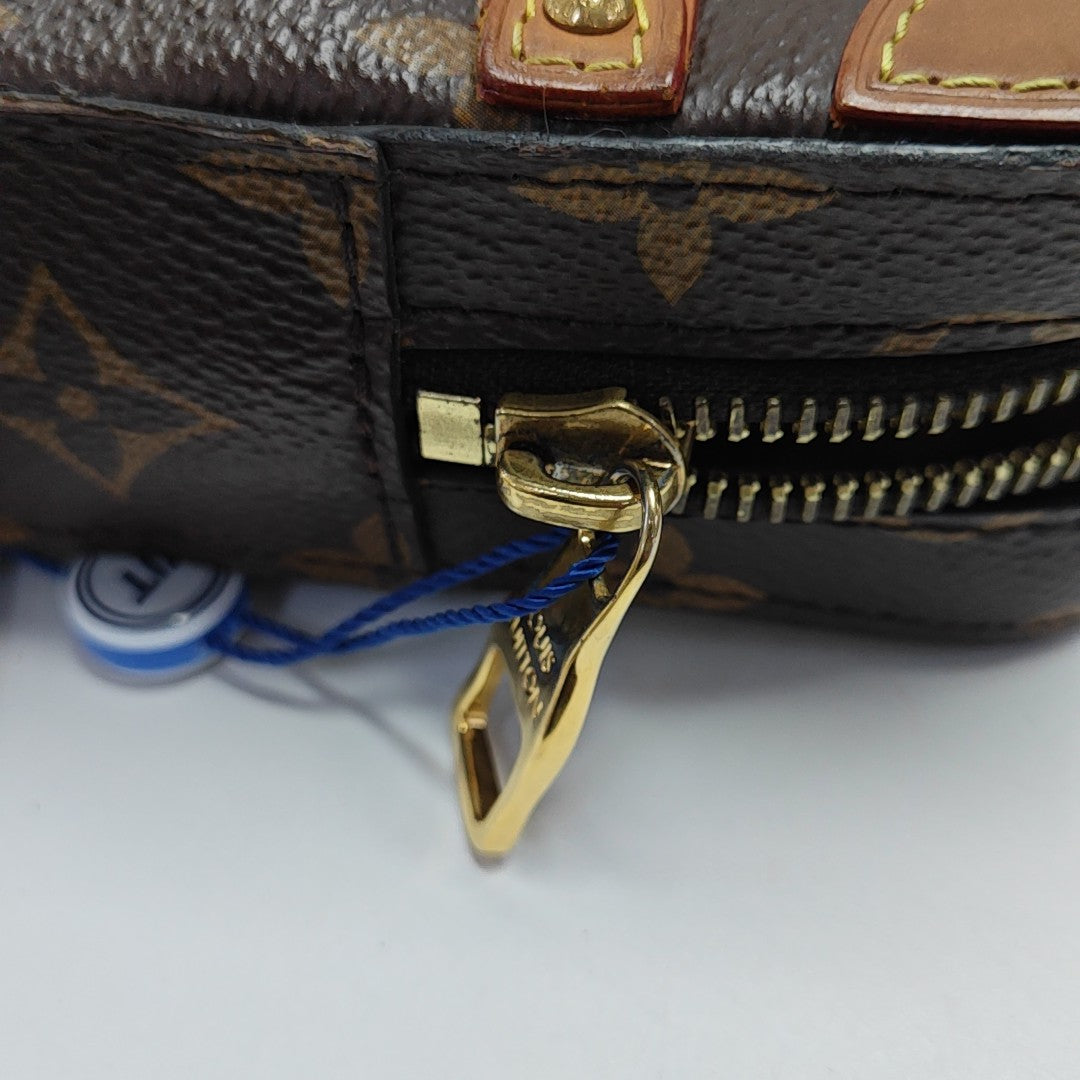 SOFT TRUNK Monogram Coated Canvas Brown