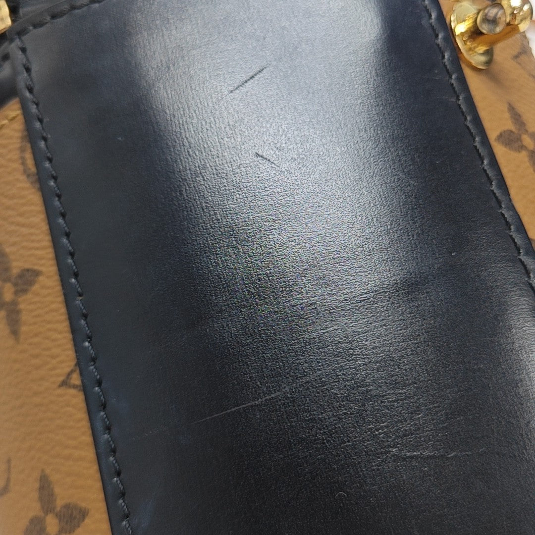 CANNES PM Monogram Coated Canvas Brown