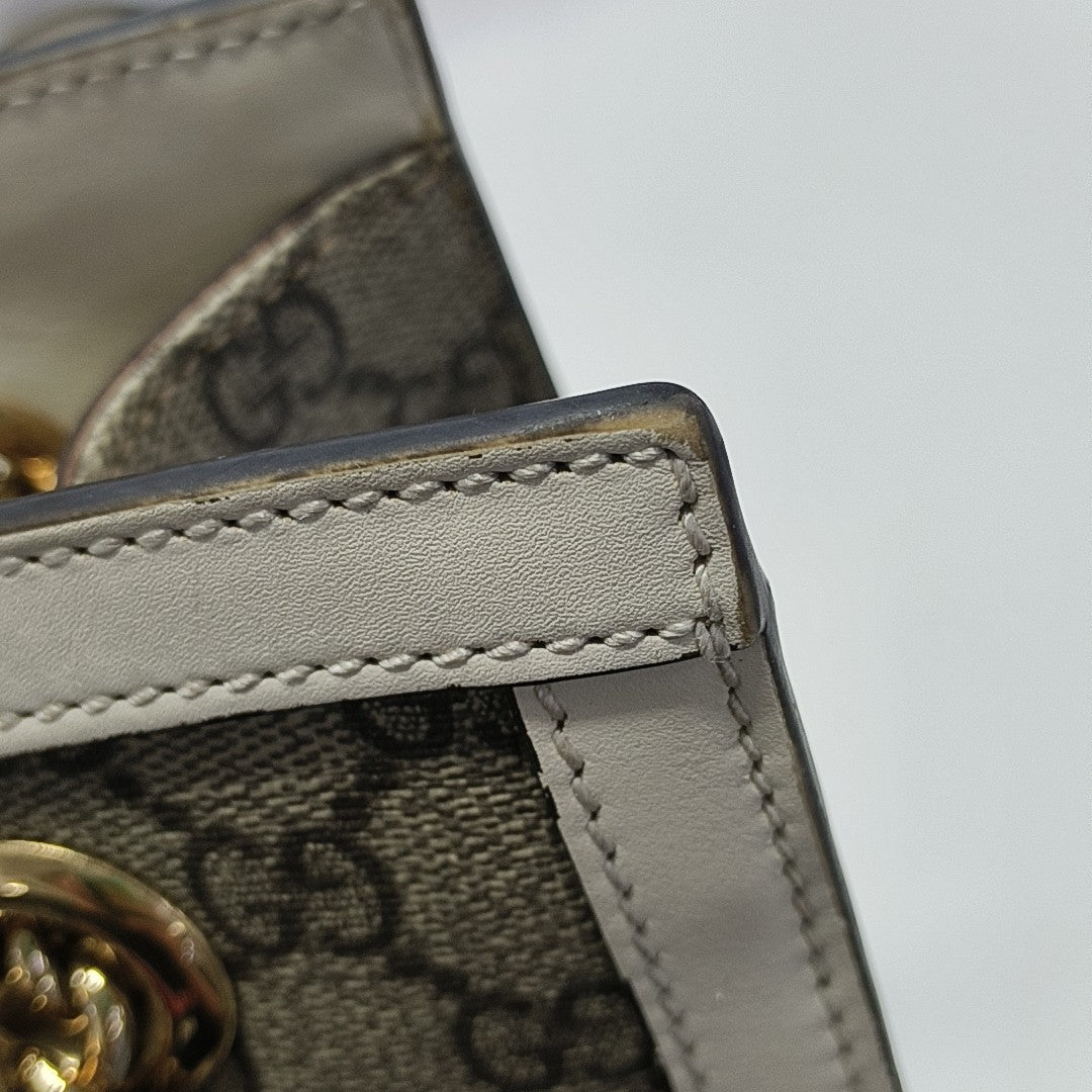 Padlock Small Monogram Coated Canvas Beige