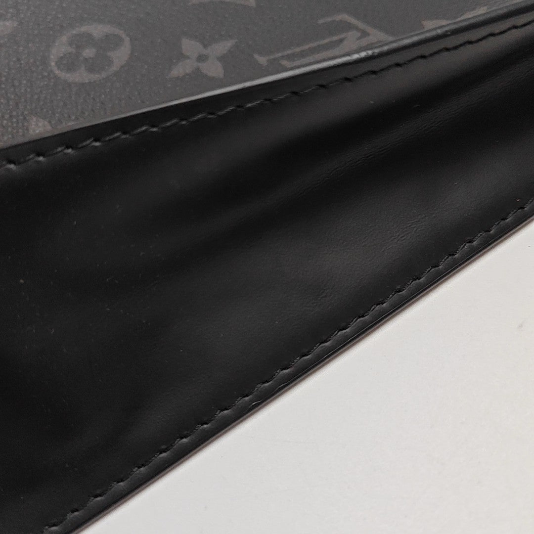 Pochette Voyag MM Monogram Coated Canvas Black