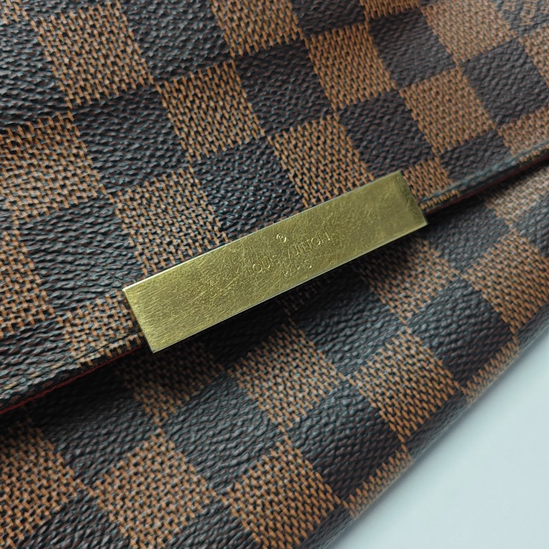 FAVORITE PM Damier Ebene Coated Canvas Brown