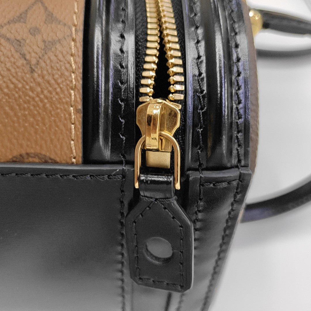 CANNES PM Monogram Coated Canvas Brown