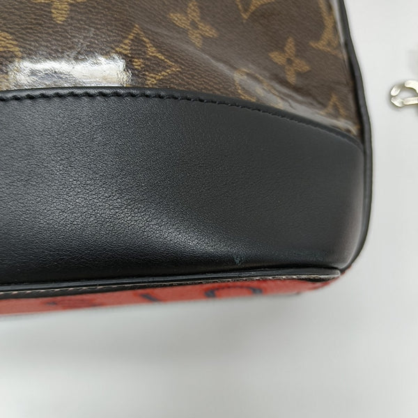 EXPLORER Monogram Coated Canvas Brown