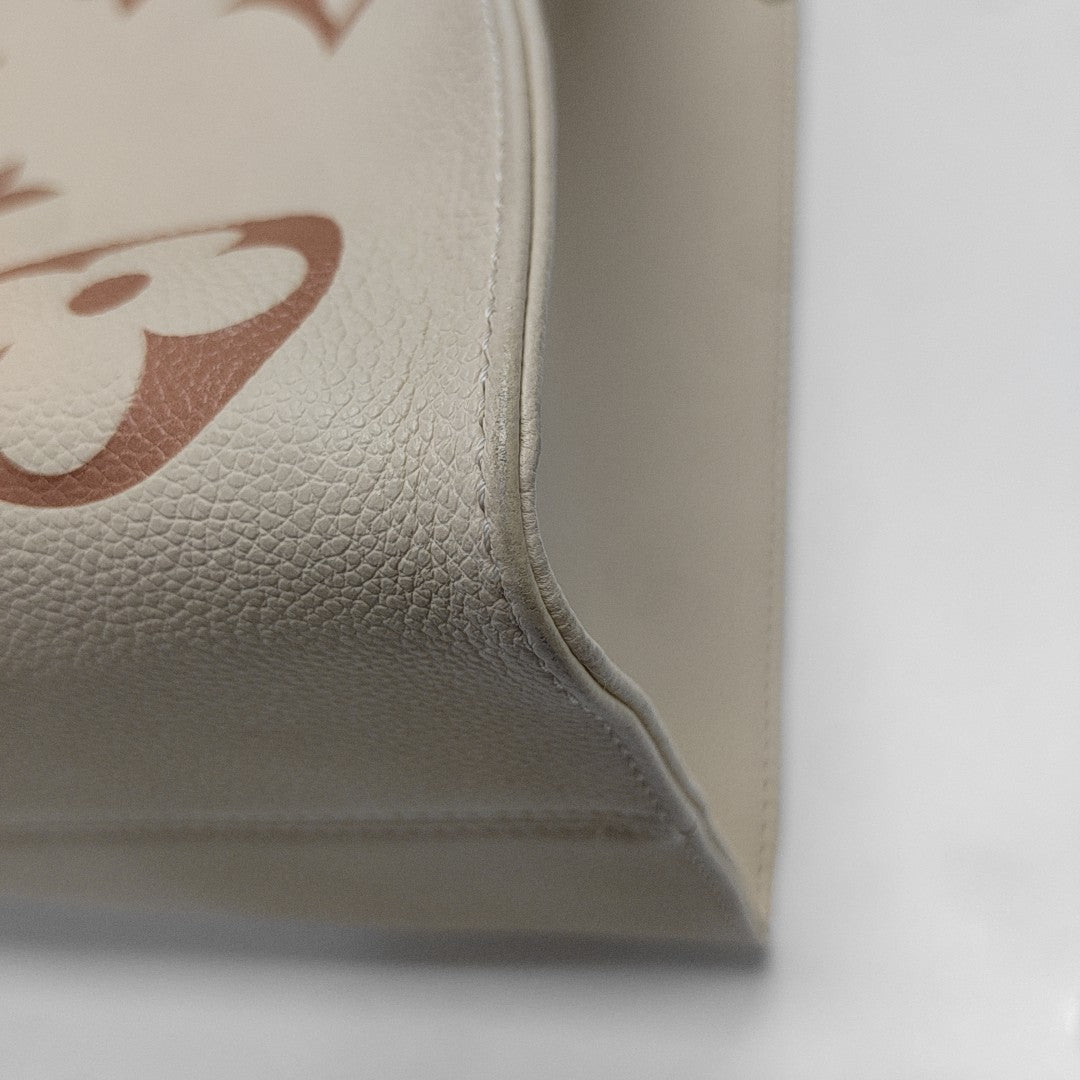 ONTHEGO MM Monogram Calfskin Beige