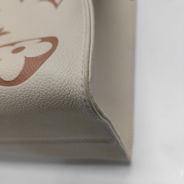 ONTHEGO MM Monogram Calfskin Beige