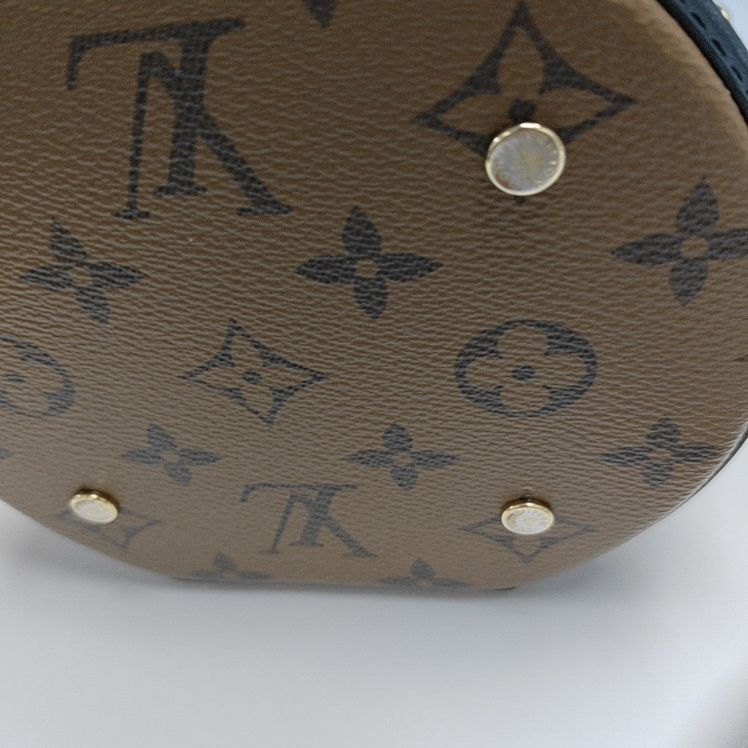 CANNES PM Monogram Coated Canvas Brown