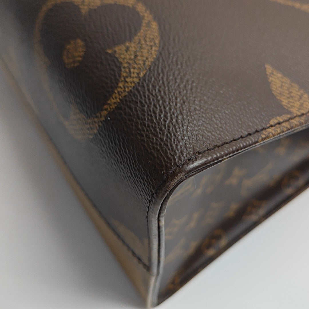 ONTHEGO GM Monogram Coated Canvas Brown
