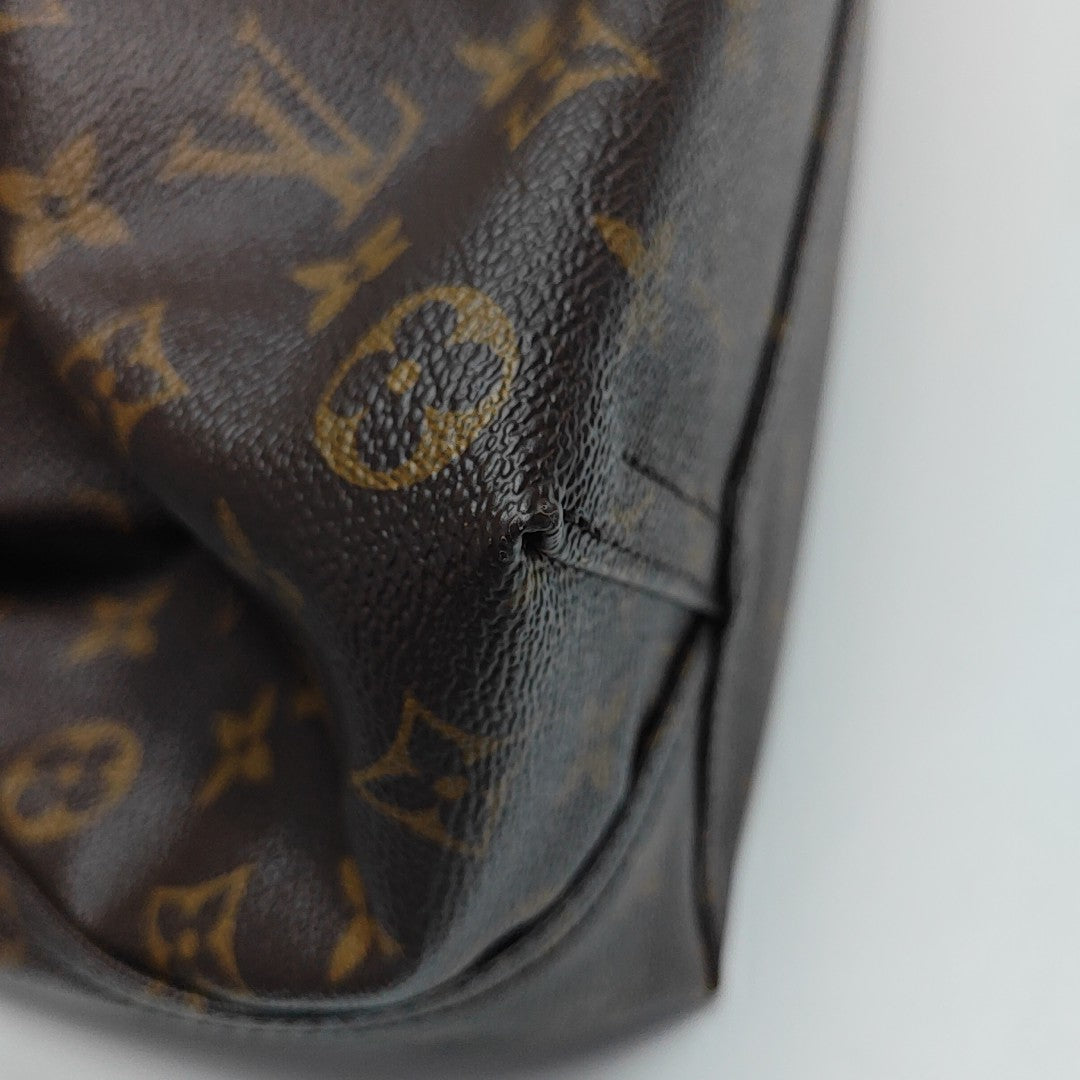 ATLANTIS Monogram Coated Canvas Brown