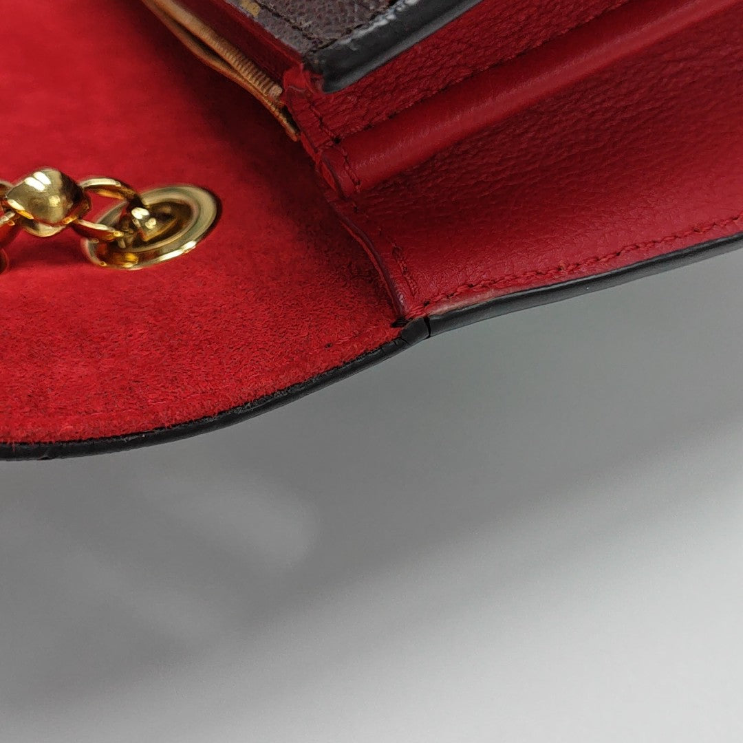 VICTOIRE Monogram Coated Canvas Brown