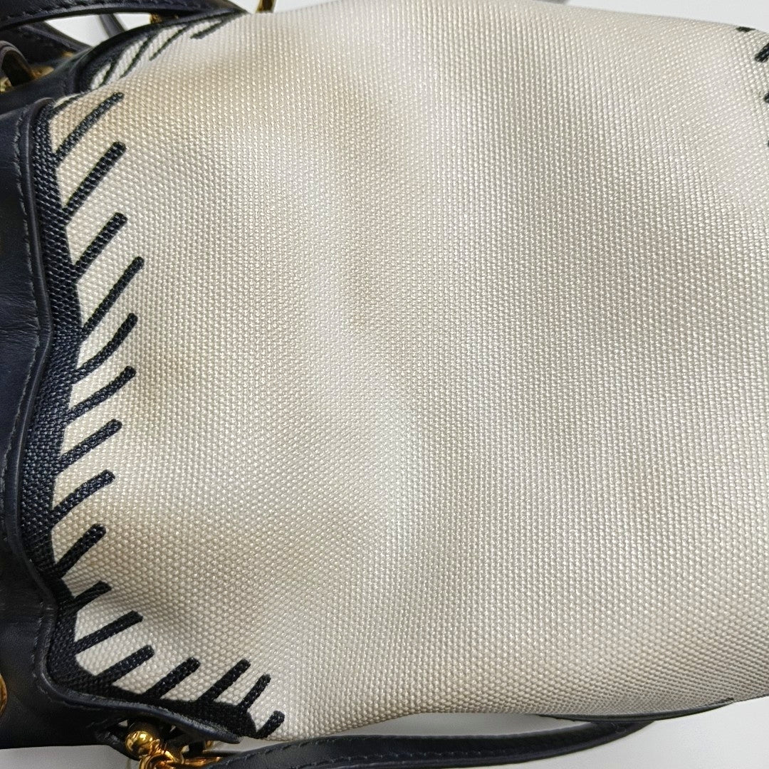 Authenticated pre-owned  Mon Tresor Mini Fabric White - Bucket Bag at Looply