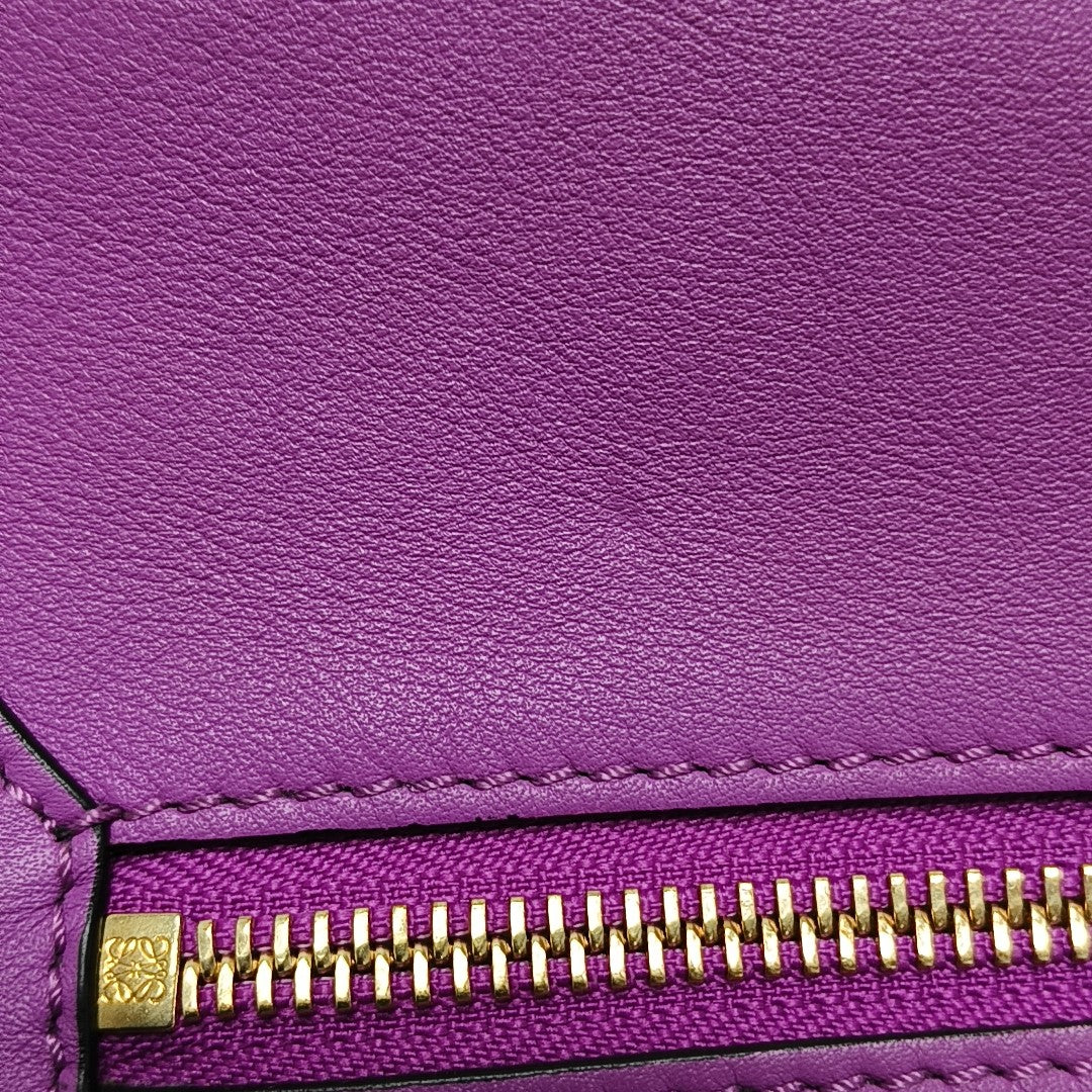 Authenticated pre-owned  Puzzle Hobo Calfskin Purple - Top Handle Bag at Looply