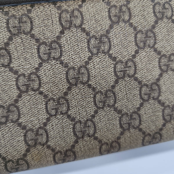 Monogram Coated Canvas Clutch Black