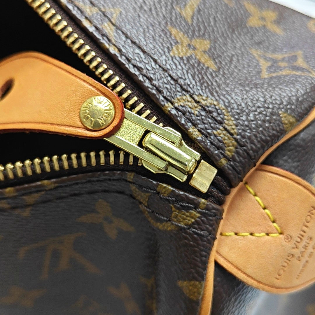 Authenticated pre-owned  SPEEDY 35 Monogram Coated Canvas Brown - Top Handle Bag at Looply