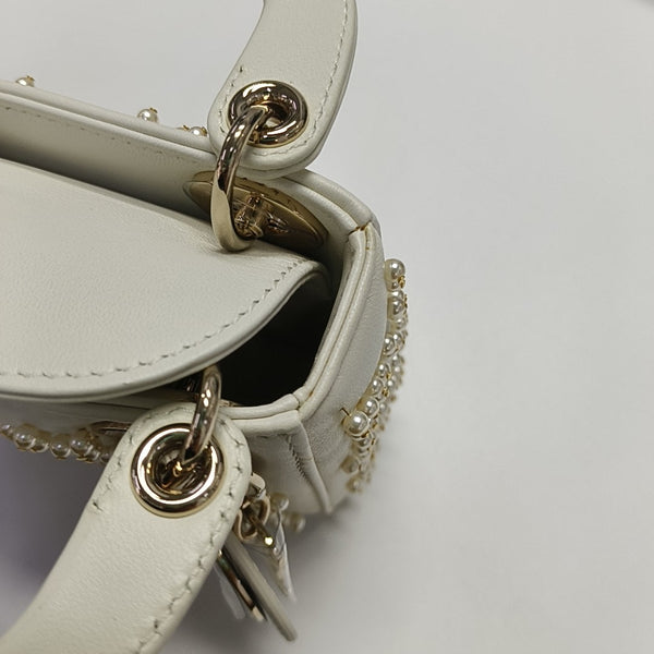 Authenticated pre-owned  Lady Dior Super Mini Quilted Lambskin White - Tote Bag at Looply