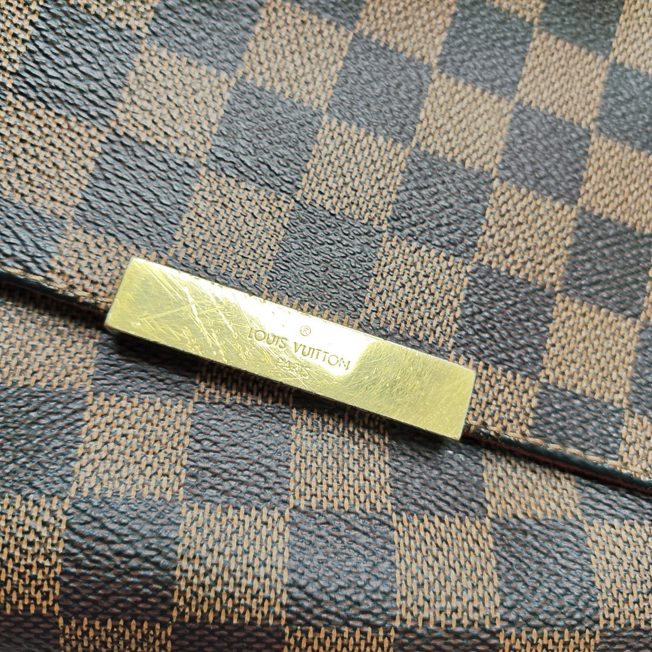 FAVORITE MM Damier Ebene Coated Canvas Brown