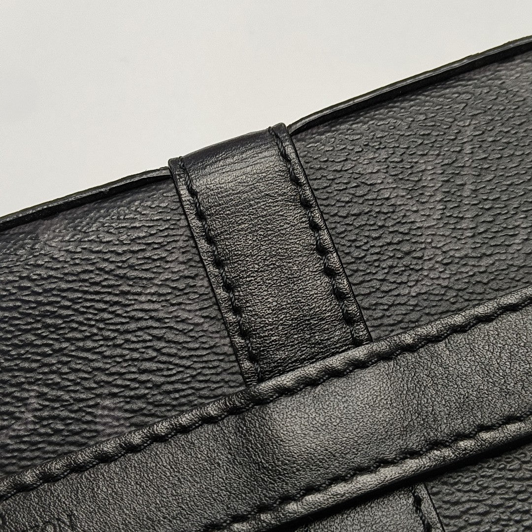 TRUNK PM Monogram Coated Canvas Black