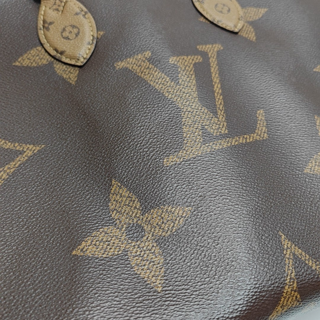 ONTHEGO MM Monogram Coated Canvas Brown