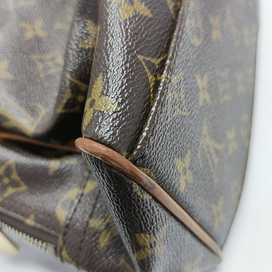 MANHATTAN GM Monogram Coated Canvas Brown