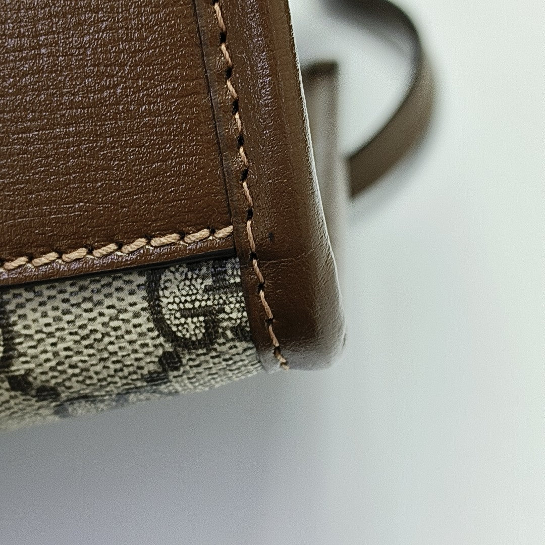 Retro Small Monogram Coated Canvas Brown