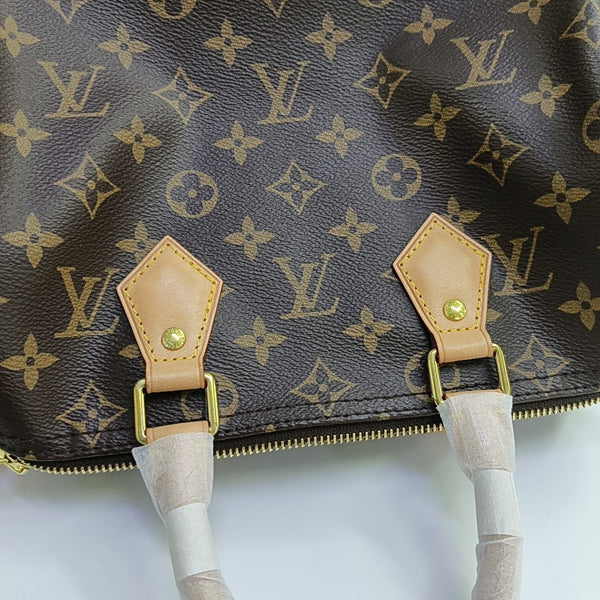 SPEEDY 25 Monogram Coated Canvas Brown