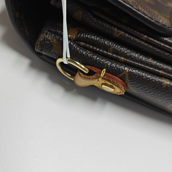 MÉTIS MM Monogram Coated Canvas Brown