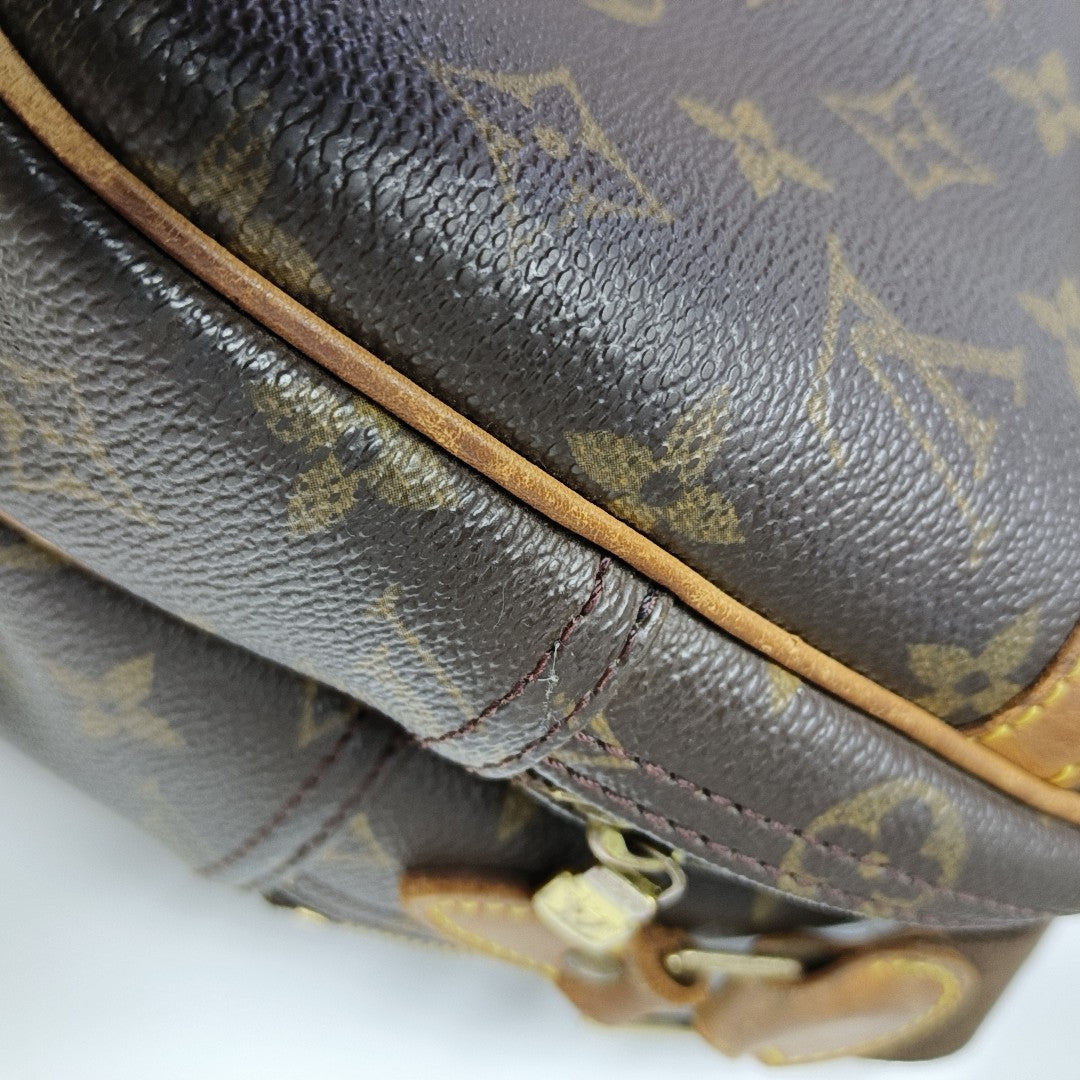 REPORTER PM Monogram Coated Canvas Brown