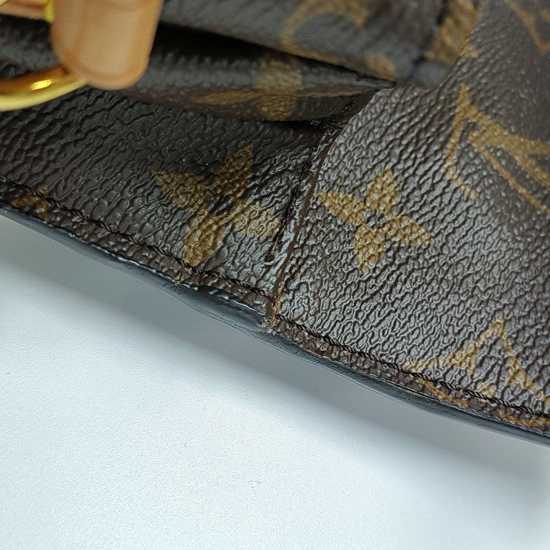 MÉTIS MM Monogram Coated Canvas Brown