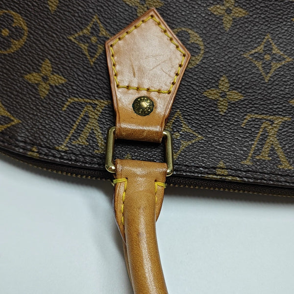 ALMA PM Monogram Coated Canvas Brown