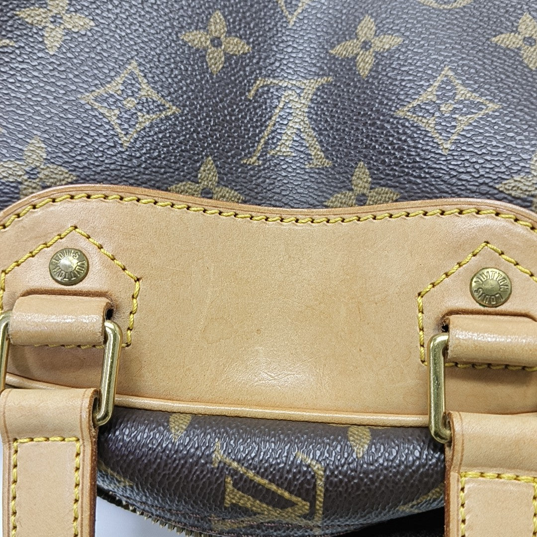 EXCURSION Monogram Coated Canvas Brown