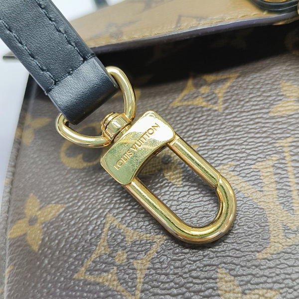 EDEN Monogram Coated Canvas Brown