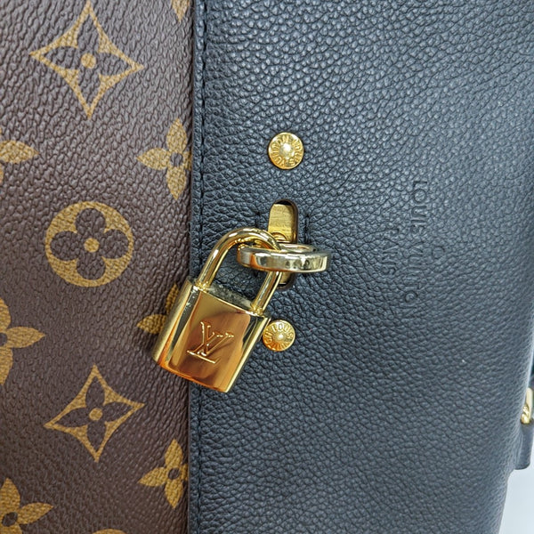 VÉNUS Monogram Coated Canvas Brown