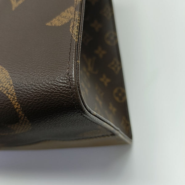 ONTHEGO GM Monogram Coated Canvas Brown