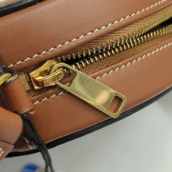 Authenticated pre-owned  TRIOMPHE Small Calfskin Brown - Crossbody Bag at Looply