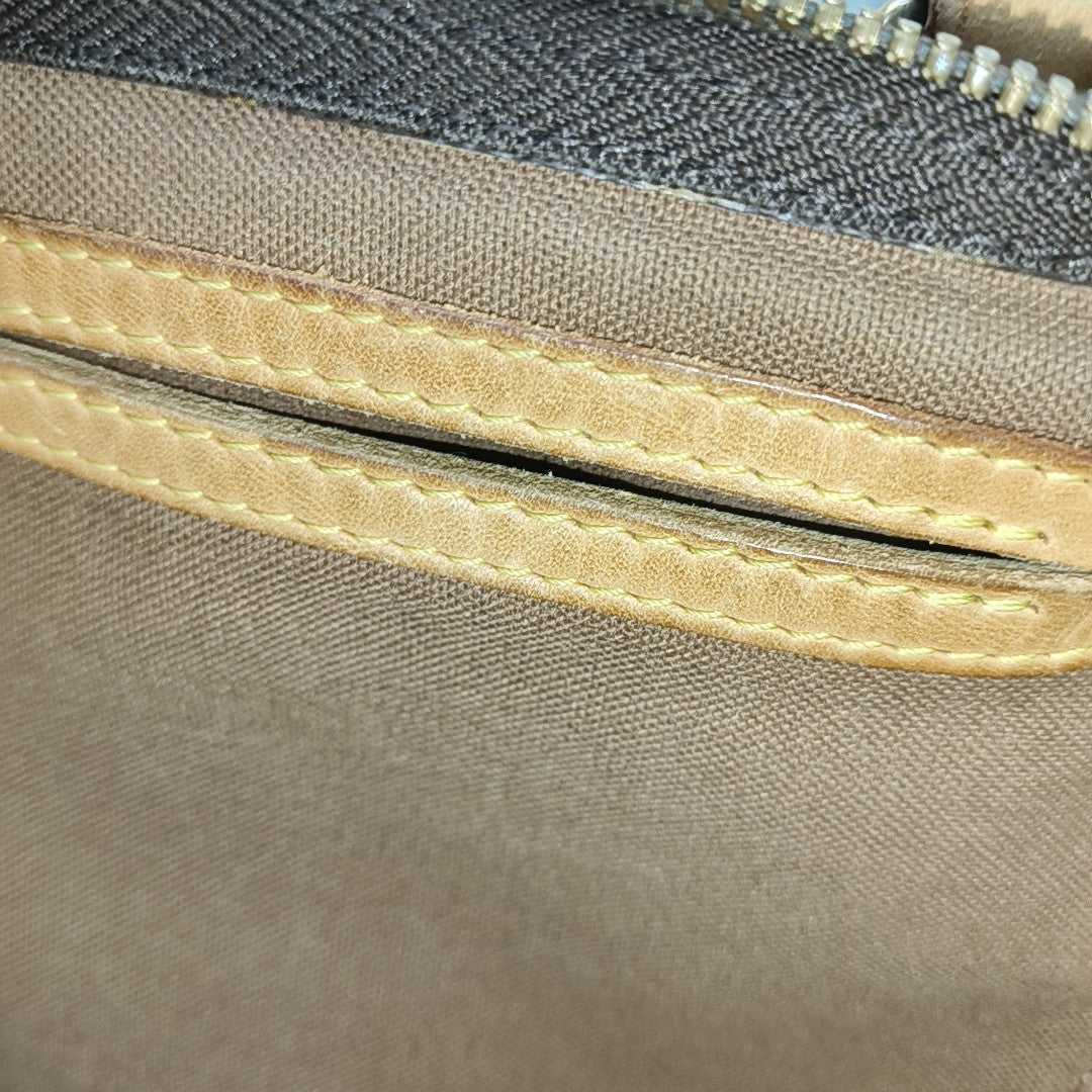 SPEEDY 30 Monogram Coated Canvas Brown