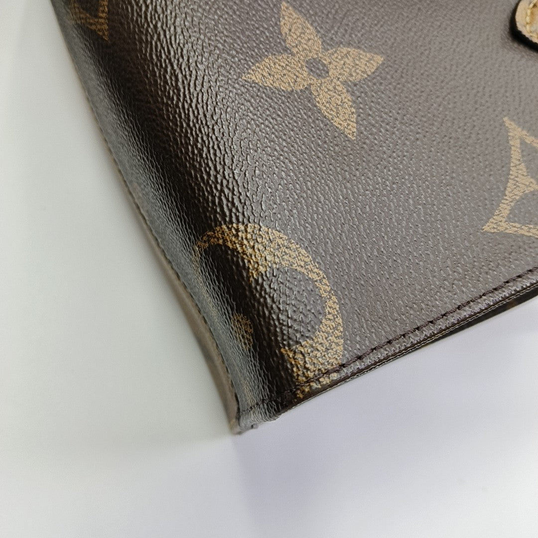 ONTHEGO PM Monogram Coated Canvas Brown