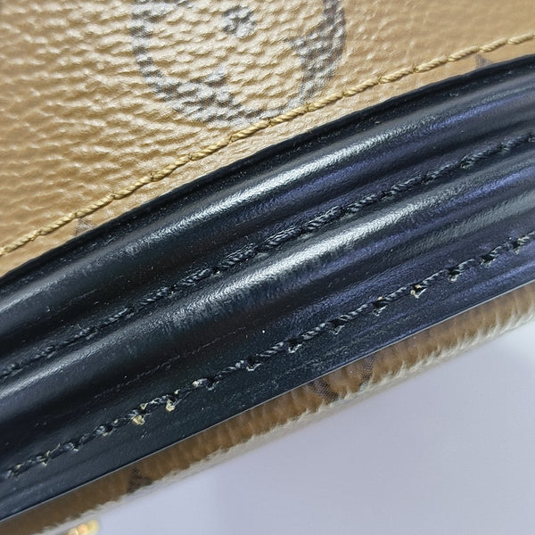 CANNES PM Monogram Coated Canvas Brown