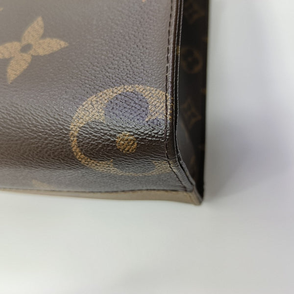 ONTHEGO PM Monogram Coated Canvas Brown